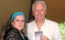 Fred van Eijk receives book from new Travel Counsellor Dorothea